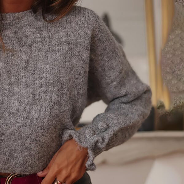 c3918a98-bd68-4f3d-9ea2-244077febc69.jpg Suéter con puños con volantes para mujer