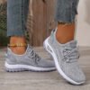 Zapatillas de deporte de malla informales de moda para mujer con tejido volador