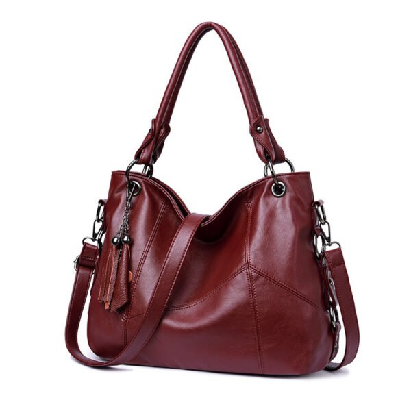 6b0d6b7a-4434-4cd7-b3b6-2ff93d781c06.jpg Bolso bandolera portátil con borlas de PU y costuras de moda para mujer