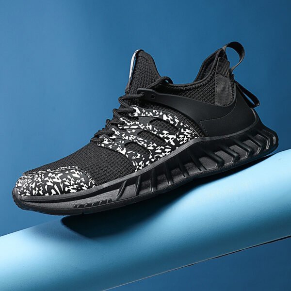 Zapatillas de deporte de malla tejida Flying